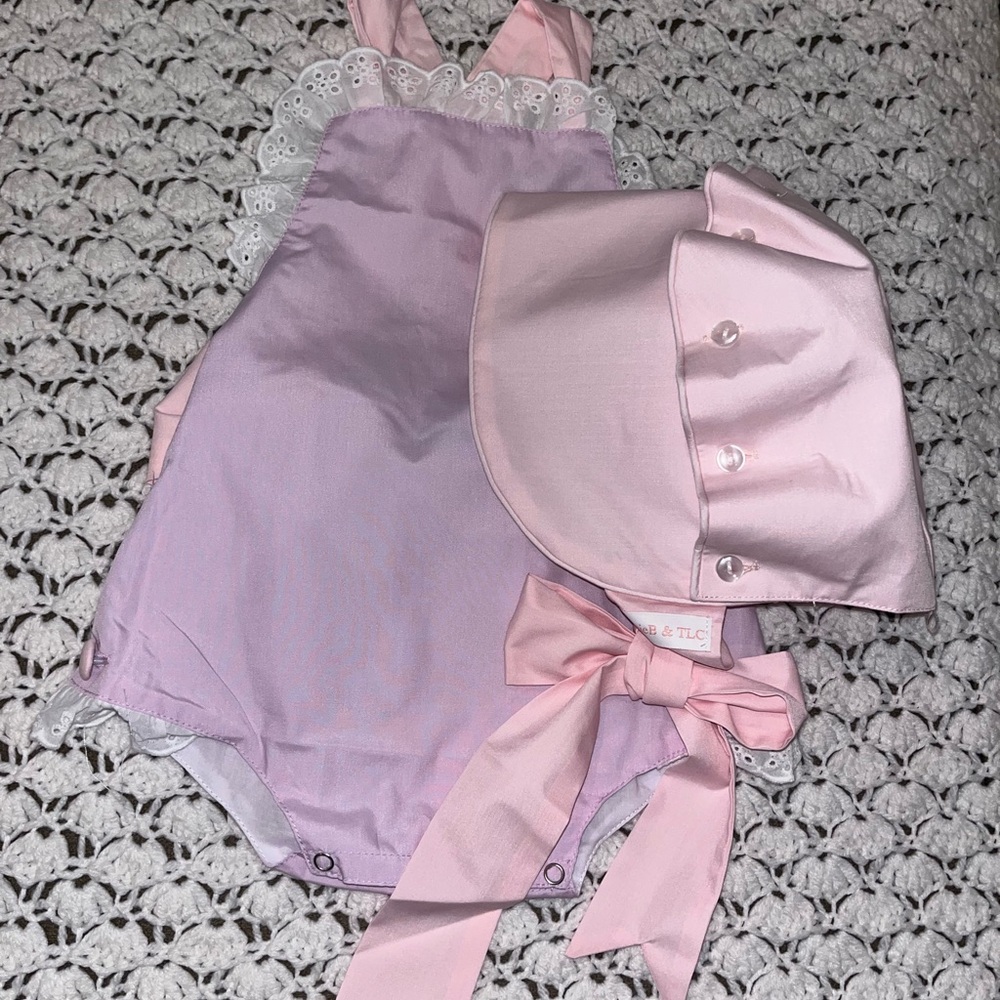 Pink and lilac Baby sunsuit with matching bonnet